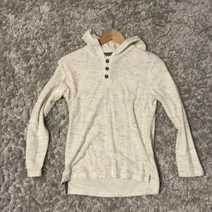 A white and gray hooded t shirt with buttons